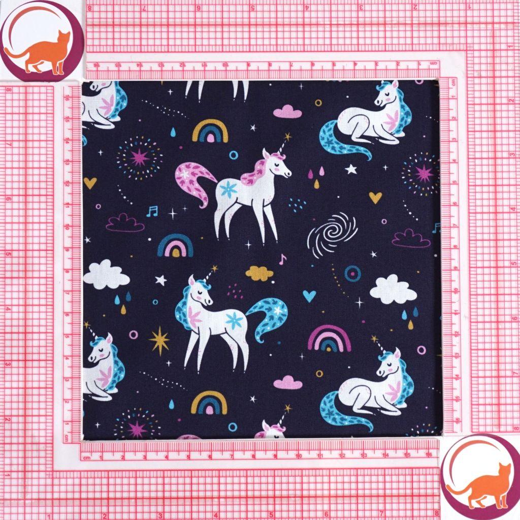 Baumwollstoff Motivdruck Einhorn Regenbogen dunkelblau rosa